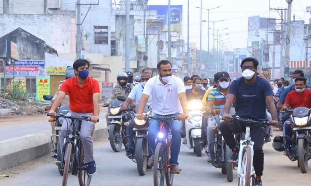 Transport Minister Puvvada Ajay Kumar along with District Collector RV Karnan and Municipal Commissioner Anurag Jayanthi taking field inspection of development works on cycle in Khammam city