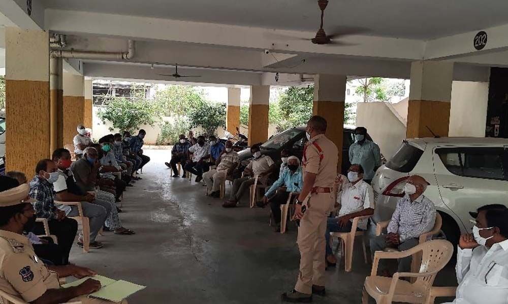Police personnel taking part in the apartment visit program