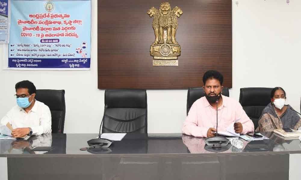 Joint Collector K Mohan Kumar addressing the heads of all religions in Vijayawada on Monday