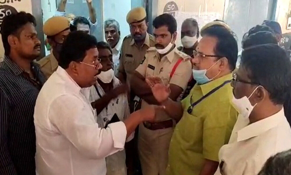 CPI Prakasam district secretary ML Narayana, MPDO Ranga Subbarayudu in heated argument over placement of names and symbols on ballot paper at Pamur on Thursday