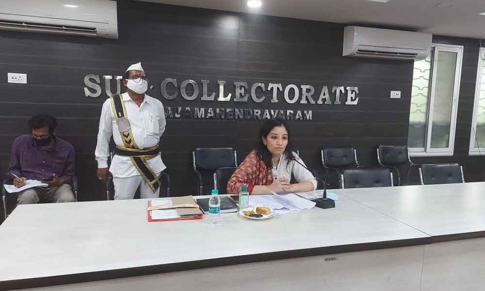 Sub-Collector Anupama Anjali reviewing ‘Teeka Utsav’ arrangements with officials in Rajamahendravaram on Friday