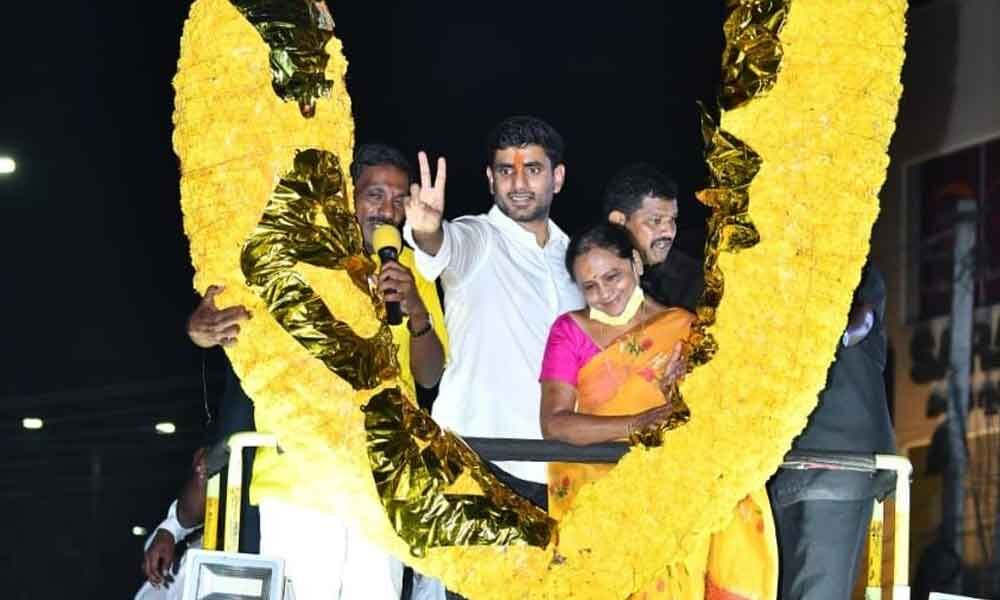 TDP national general secretaryNara Lokesh participating in a road show in Tirupati on Monday. Party nominee Panabaka Lakshmi is also seen