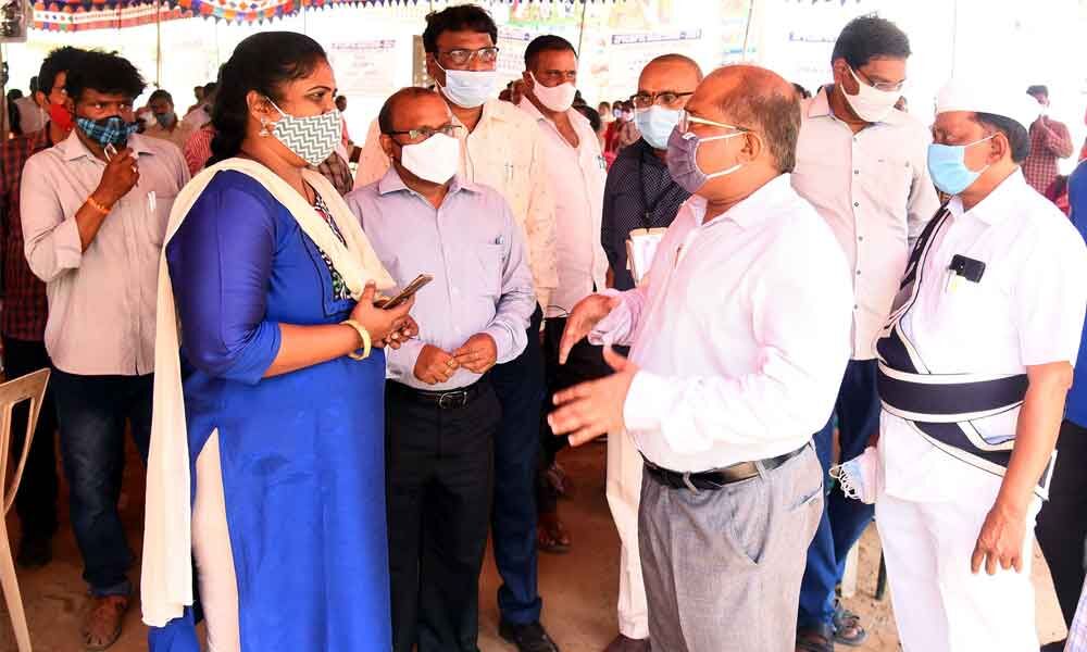 Krishna district Collector Md Imtiaz discussing with officials at the polling material distribution centre at Montessori Mahila College in Vijayawada Krishna district Collector Md Imtiaz discussing with officials at the polling material distribution centre at Montessori Mahila College in Vijayawada